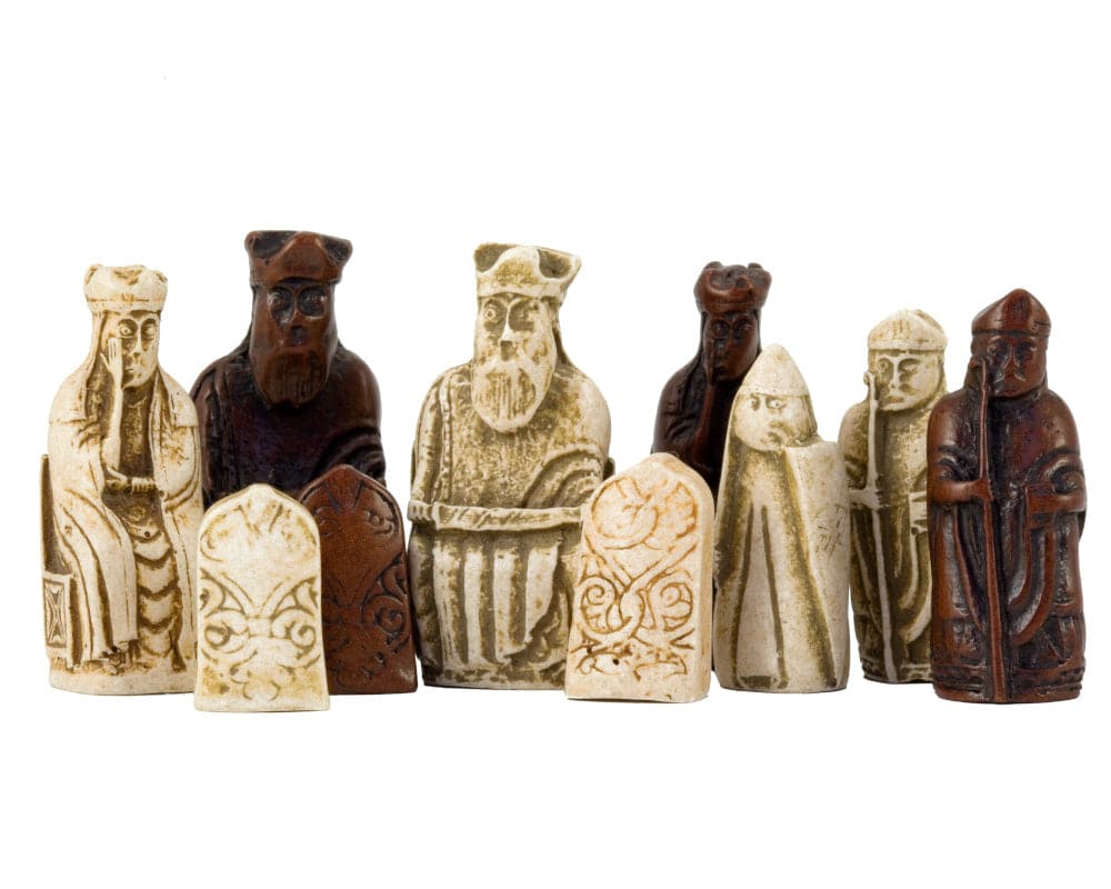 Isle of Lewis miniature chessmen in stoneware, part of the Celtic Compact Chess Set, showcasing iconic historical chess pieces.