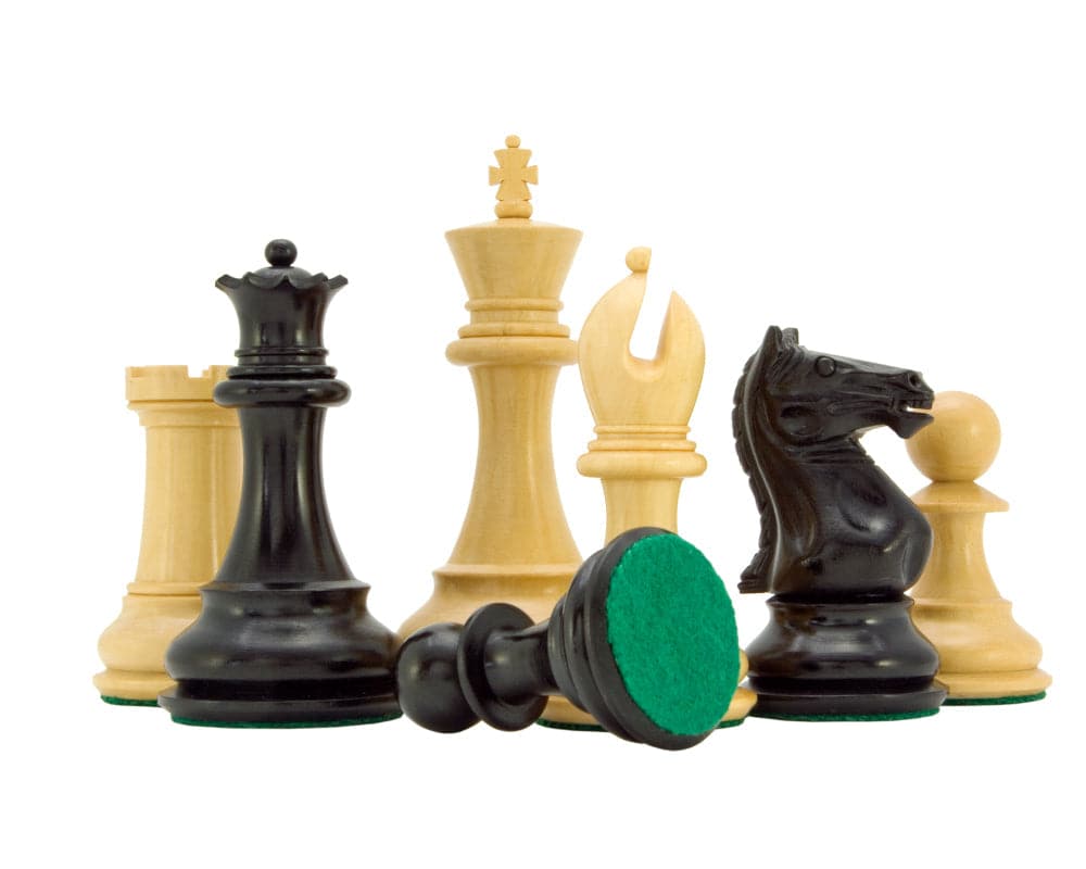 Sentinel Series Ebony and Boxwood Staunton Chess Pieces with 4 inch King and Green Billiard Cloth Bases.