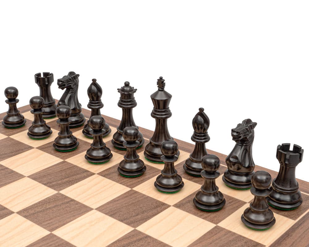 The Stallion Knight Ebonised Chess Pieces in Traditional Staunton Design on a Chessboard