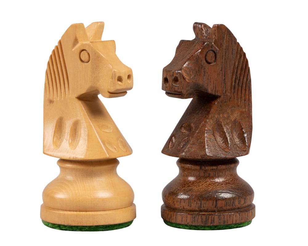 Down Head Acacia 3 inch chess pieces showing light and dark wood knights with green billiard cloth bases.