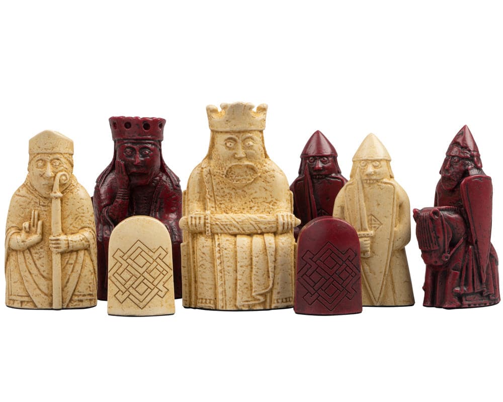 Isle of Lewis red and ivory chessmen set by The Regency Chess Company, hand made in the UK, featuring detailed, heavy stone resin pieces.