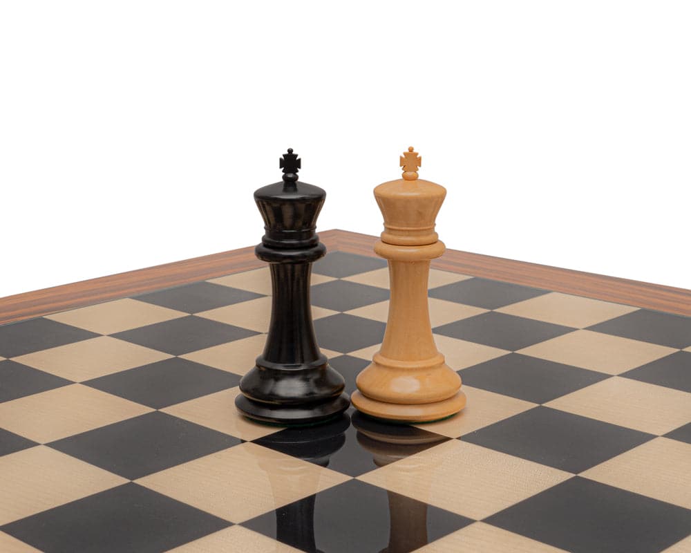 Reproduction Staunton Ebony and Boxwood Chessmen 1849 Model 4.4 inch King on chessboard