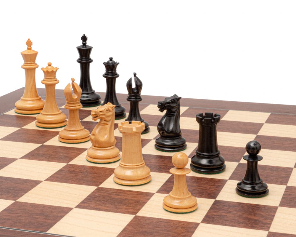 1853 Paulsen Reproduction 3.5 inch Chess Men in Ebony on a chessboard showing intricate Staunton design and high-quality finish