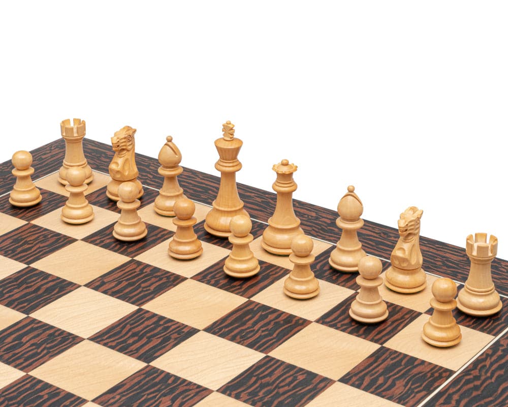 Classic Staunton wooden chess pieces on a chessboard, showcasing the 3.5 inch ebonised and boxwood chessmen set with two additional queens