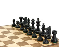 French Knight ebonised chess set with compact walnut board and oversized playing squares