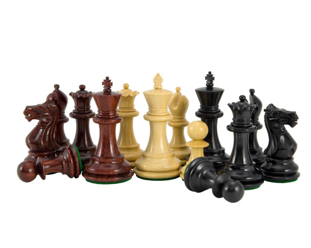 Sandringham Tres Corone 2.5 inch luxury chess set with pieces in red sandalwood, ebony, and boxwood on a white background.