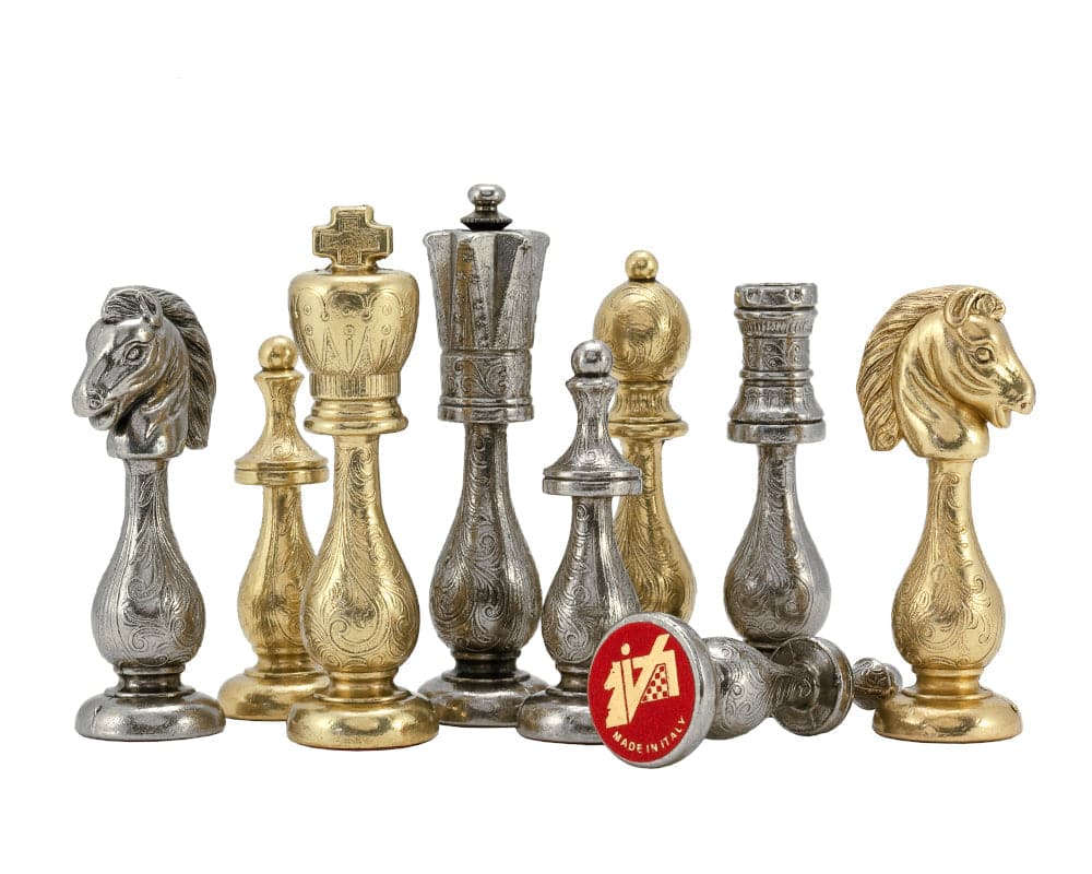 Handcrafted brass and pewter chess pieces on display, featuring intricate designs and a 'Made in Italy' emblem.