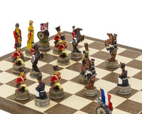Battle of Waterloo hand painted themed chess set by Italfama with navy French and red British pieces on a beautiful Spanish board.