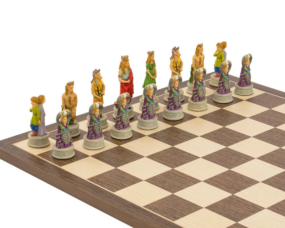 The Zodiac Hand Painted Chess Set pieces on a wooden chess board, featuring detailed and colorful zodiac-themed characters.