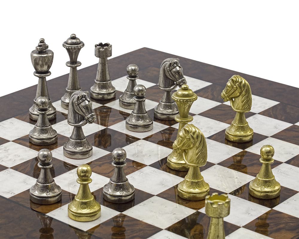 The Finnesburg and Dark Walnut Luxury Chess Set on a 17 inch Briarwood board with solid brass and nickel-plated chess pieces.