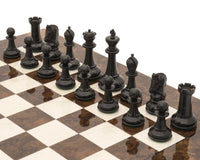 The Monarch Ebony And Walnut Grand Luxury Chess Set pieces arranged on chessboard