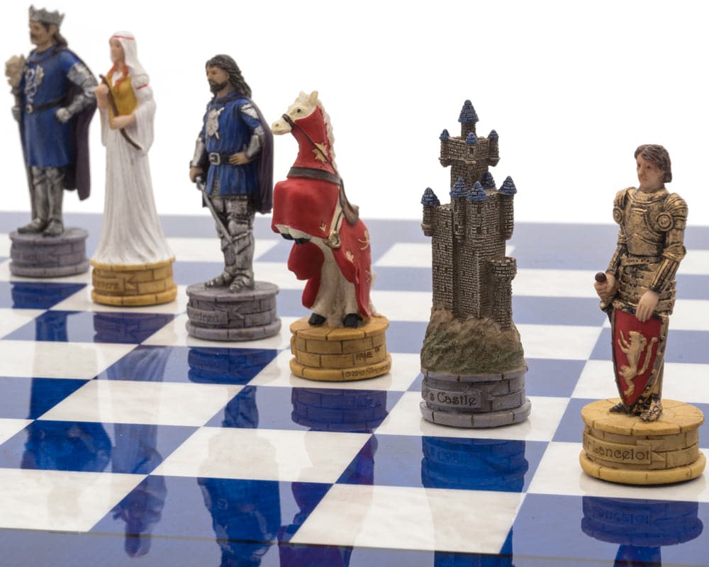 Hand-painted resin chess pieces on blue and white glossy wooden board from the King Arthur Luxury Chess Set.