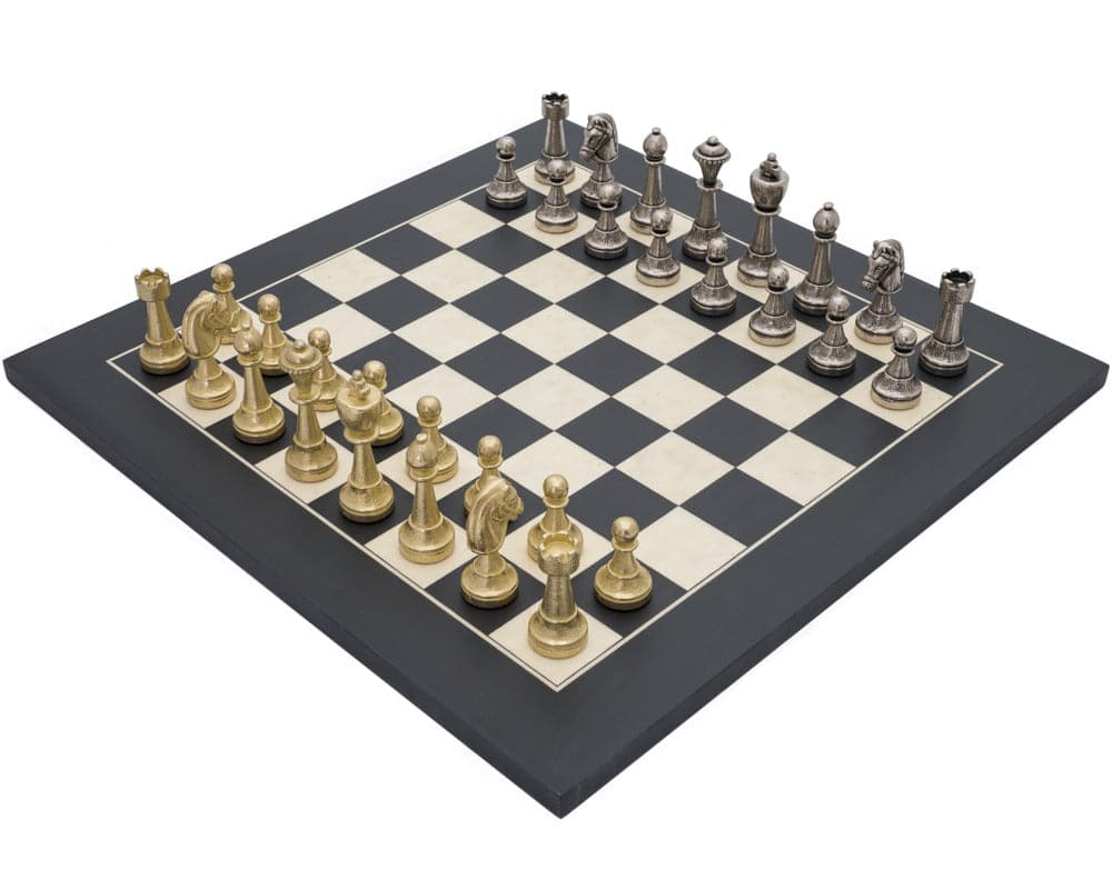 Finnesburg and Black Classic Ornate Chess Set with gold and silver pieces arranged on a black and white board.