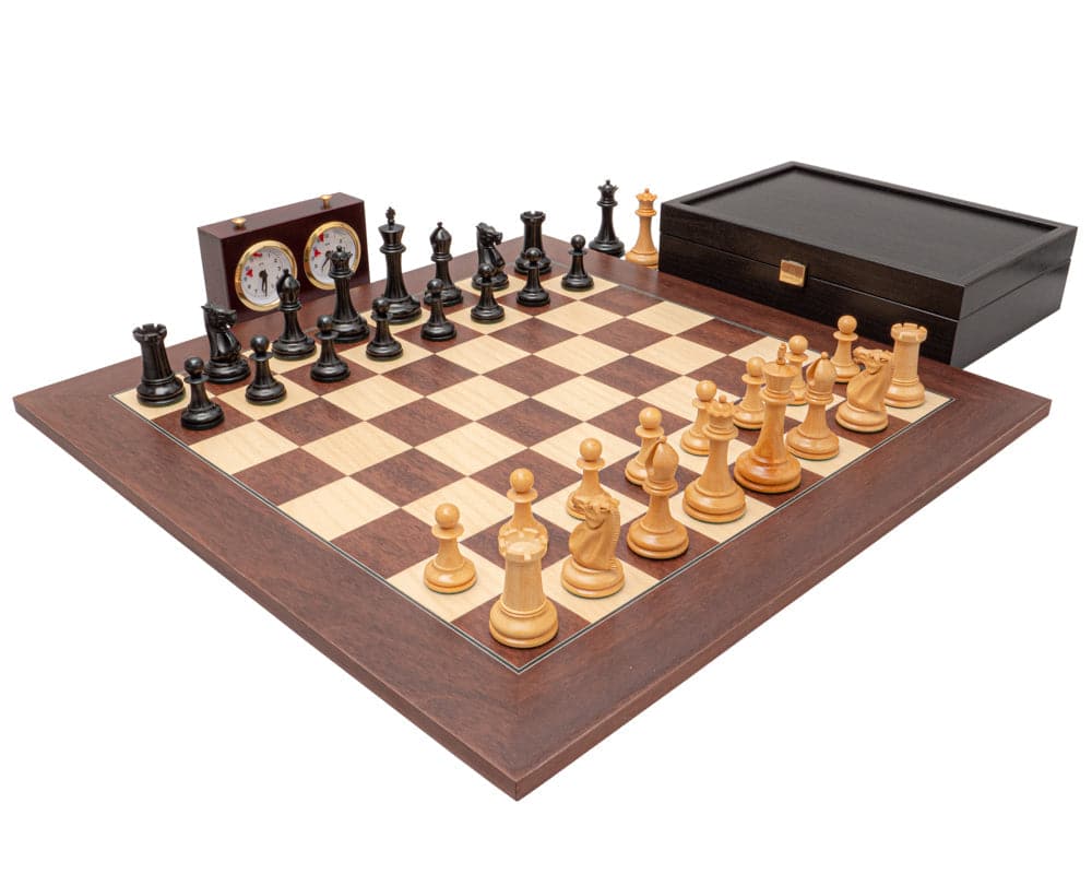 The 1853 Paulsen Reproduction Luxury Chess Set with ebony and palisander pieces on a montgoy palisander and maple board, including a chess clock and case.