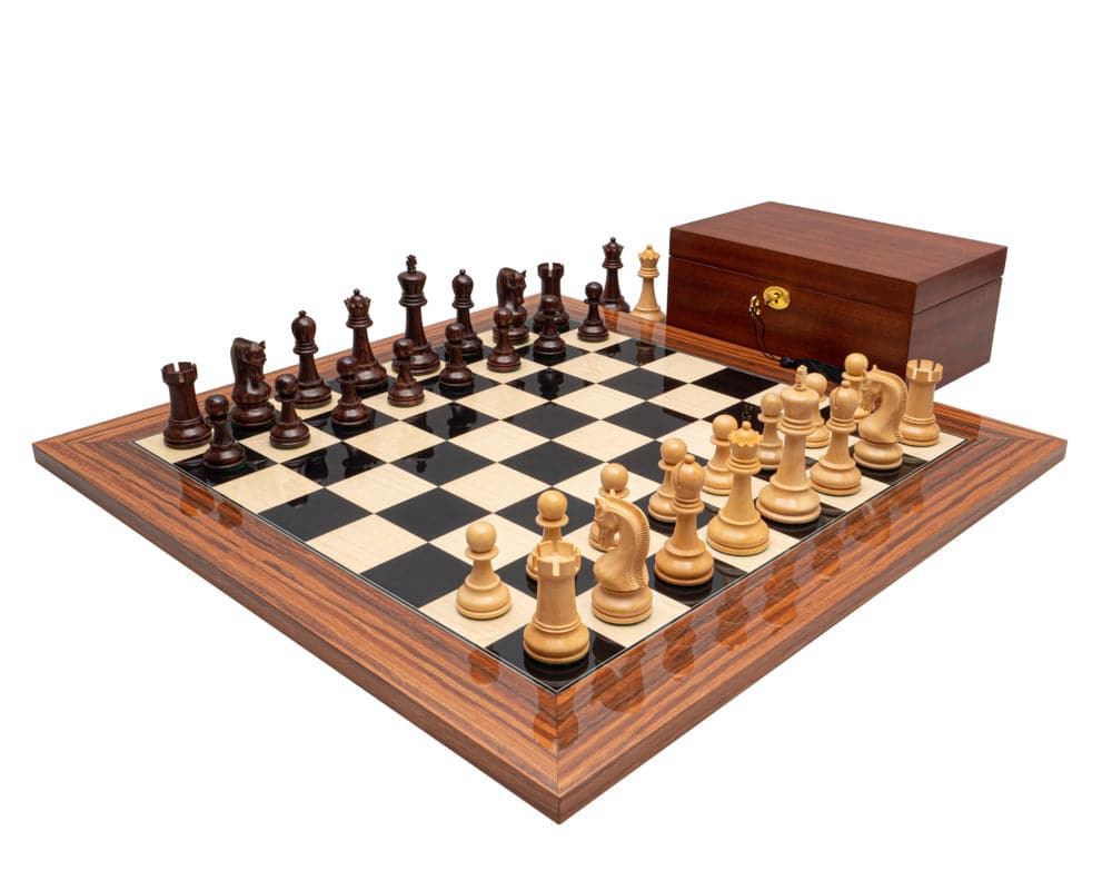 The Leningrad Anjan and Palisander Luxury Chess Set with Cabinet on a 23.6 inch Montgoy Palisander board with large playing squares.