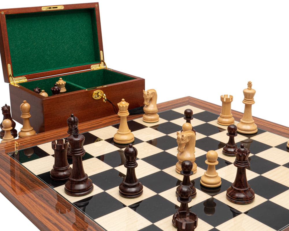 The Leningrad Anjan and Palisander Luxury Chess Set with Cabinet, showcasing a large chessboard with 2.5 inch squares and real wood veneers.